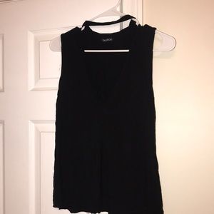 V-neck sleeveless top size M from Boohoo.